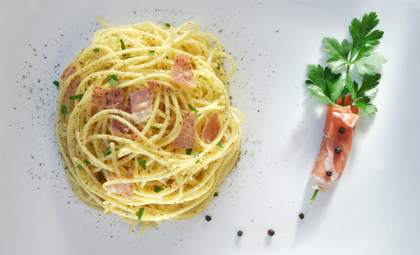 Parmigiano Reggiano Pasta with Tomato Sauce and Prosciutto
