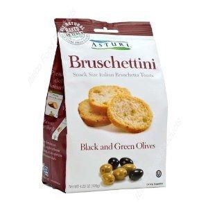 Italian bruschetta crackers with green olives and black olives.